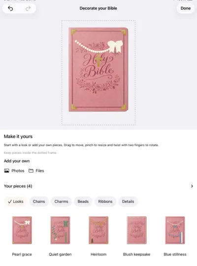 Decorate your Bible on iPad: a pink Holy Bible with a pearl strand, a bow and gold corners, above the Looks, Chains, Charms, Beads, Ribbons and Details choices